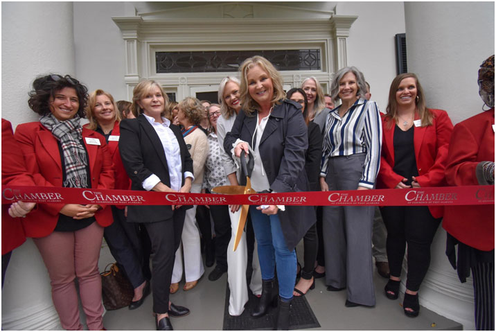 Carrie Fitts, agents and staff at the ribbon-cutting ceremony at this lovely historic home