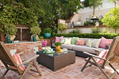 Throw pillows add pops of color to an outdoor seating arrangement