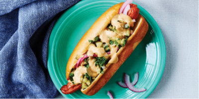 Hawaiian hot dogs topped with pineapple salsa