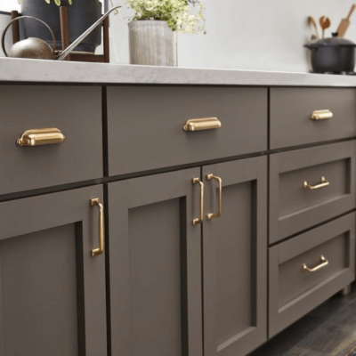 Brass hardware on kitchen cabinets
