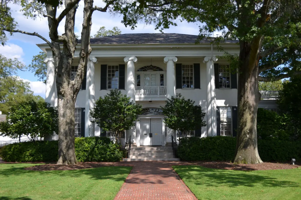 The beautiful University Club sits at the corner of Queen City Avenue and University Boulevard.