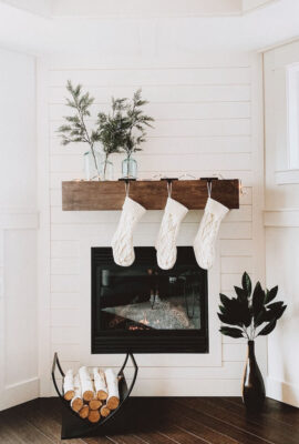 Beautiful holiday stockings hung on the fireplace